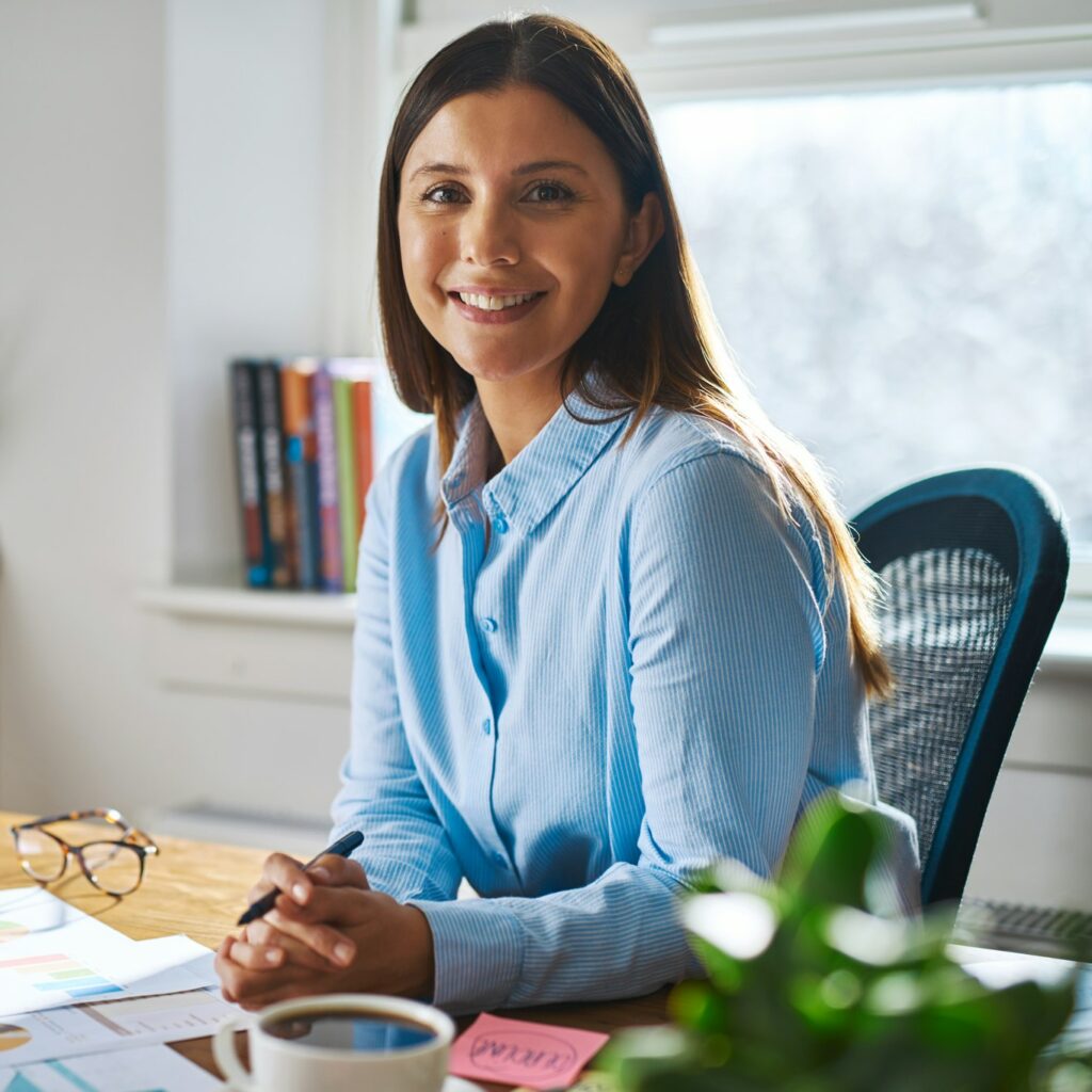 Smiling professional woman working at home